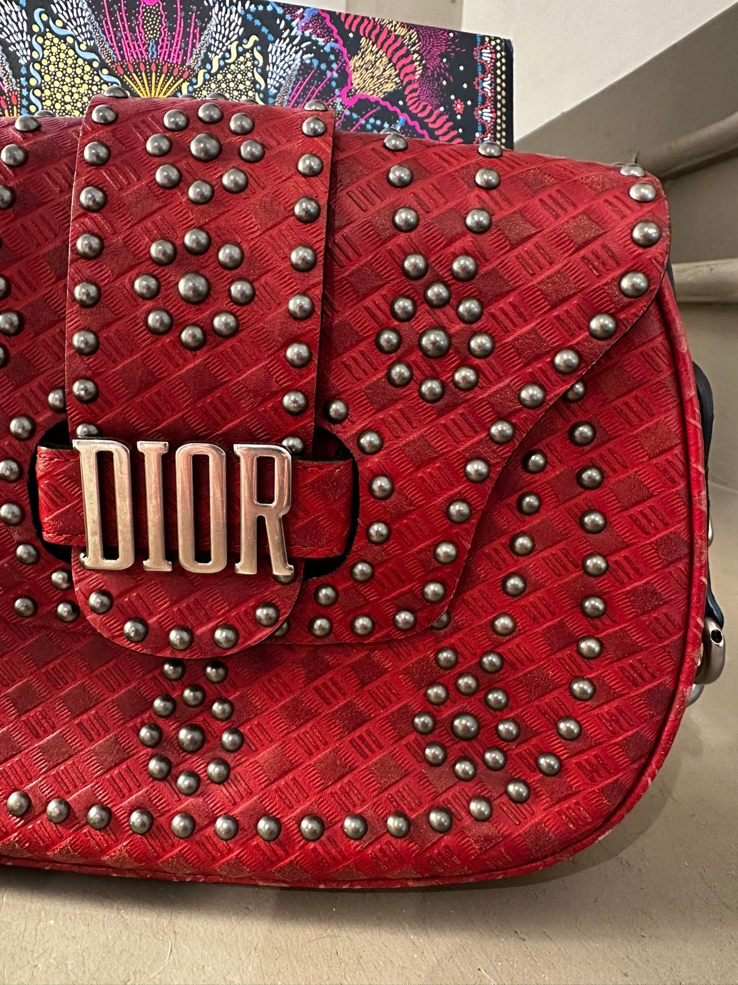 Sac Dior Stardust — Cuir rouge clouté